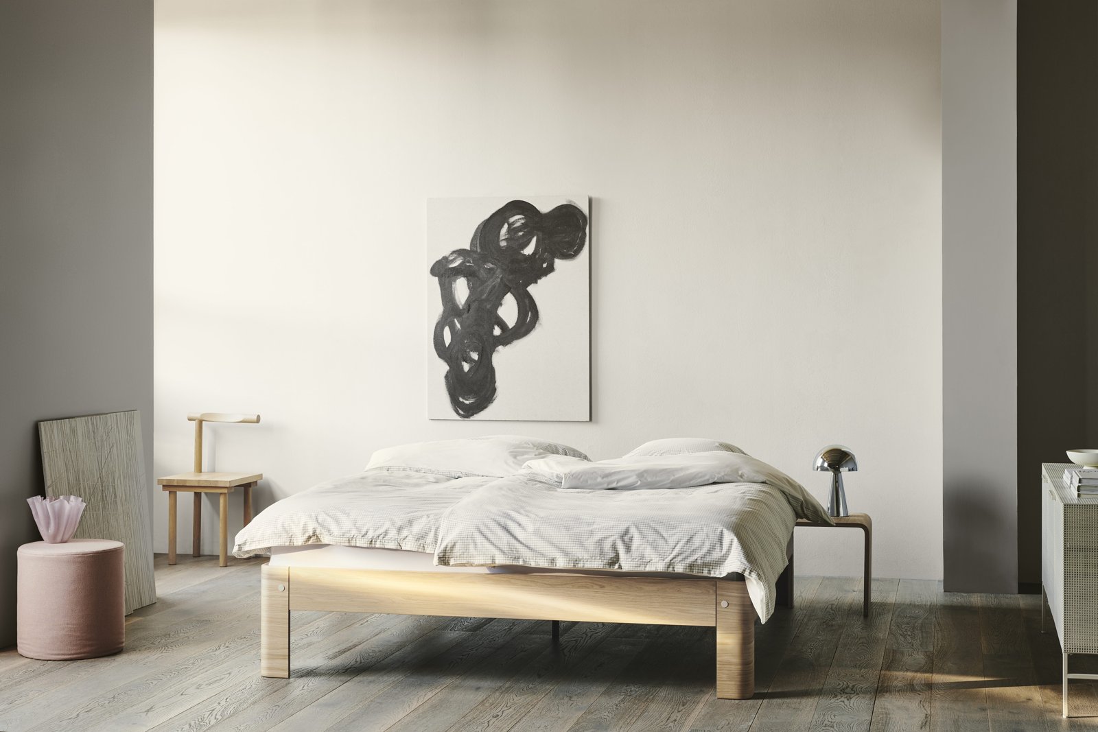 Auping Auronde bed, curved beech frame with steel spiral base, styled bedroom